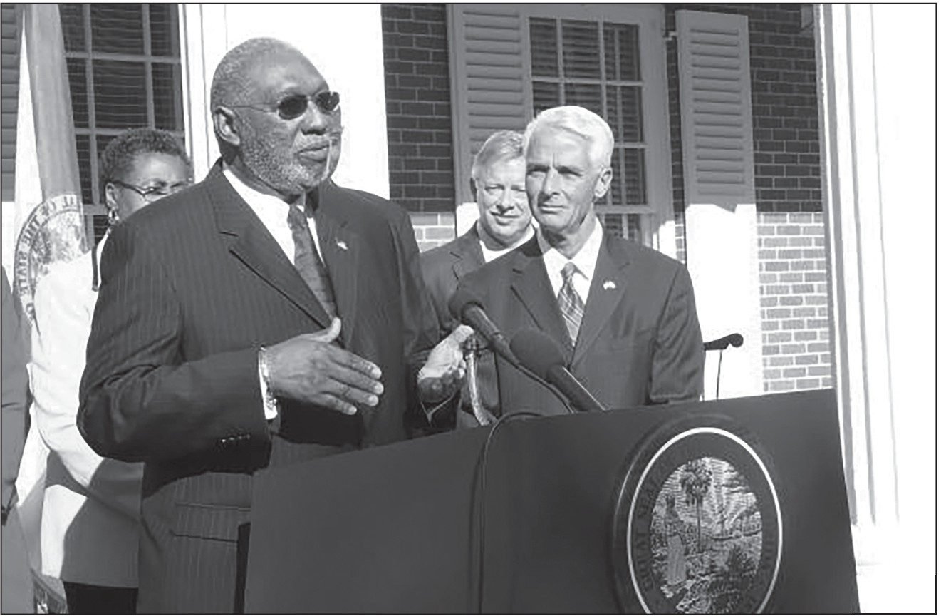 Justice Perry and Gov. Charlie Crist, 2009